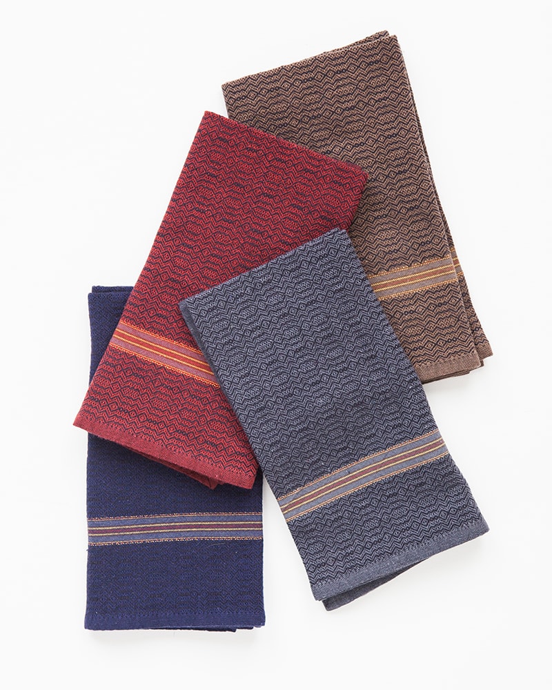 The Mungo boma cloth napkin is available in wide variety of colours - these in white indigo, black stone, black indigo and black rust. Find the one to suit your home.
