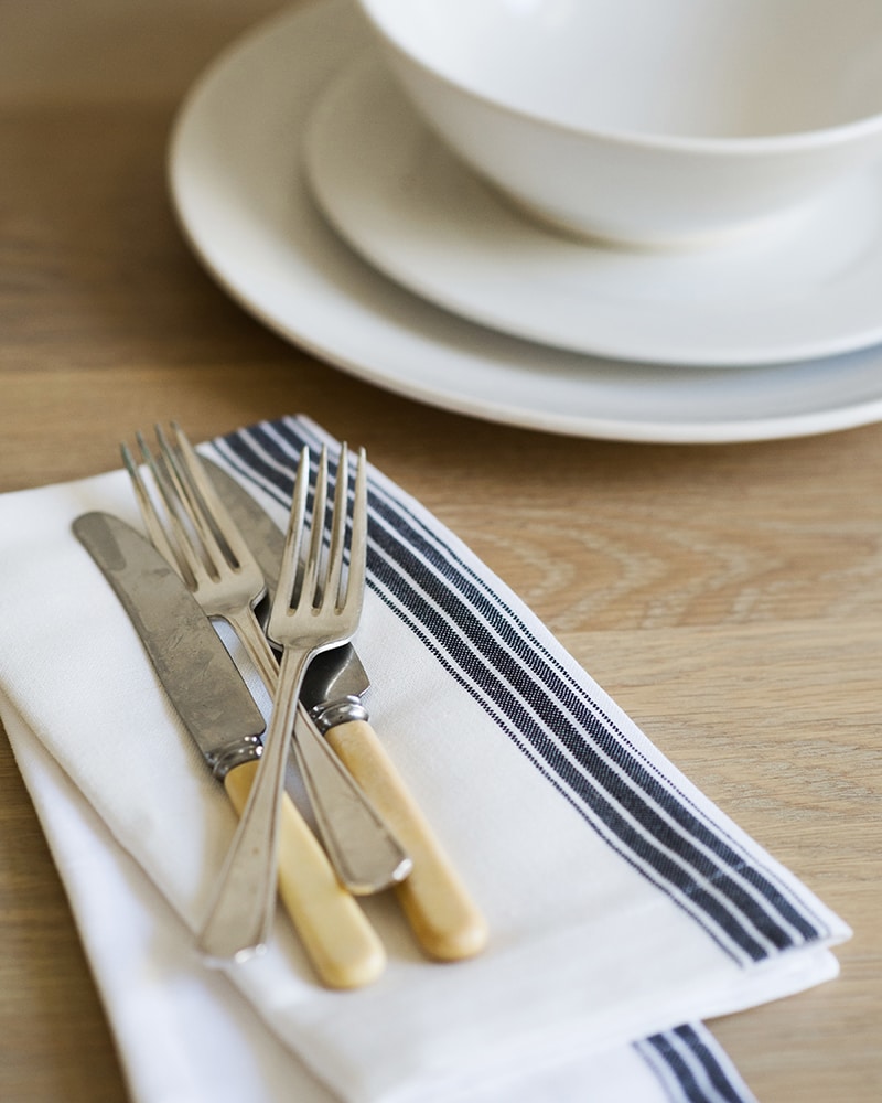 Mungo Provincial Stripe Napkins with a French Navy Stripe on white, woven at the Mungo Mill in Plettenberg Bay