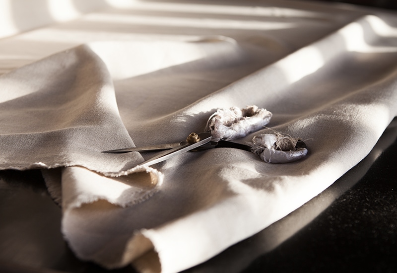 Cutting Mungo Linen in the CMT department at the Mungo Mill in Plettenberg Bay