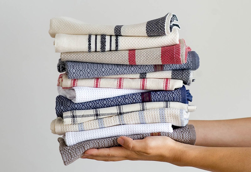 Stack of folded Mungo kitchen towels and dish cloths