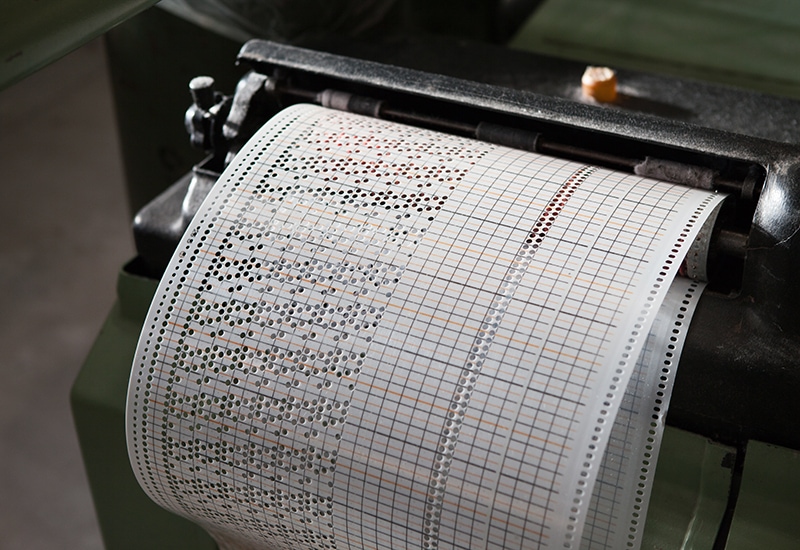 Hand punched pattern card before being fed into a loom at the Mungo Mill in Plettenberg Bay
