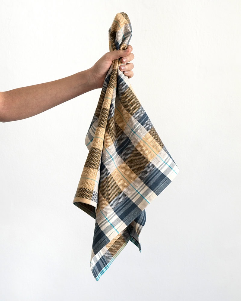 The Mungo Vadoek cloth shown here in the Chicory colourway is woven from 100% cotton at our mill in South Africa.