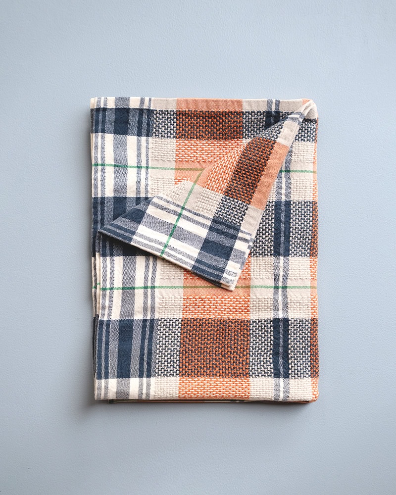 Mungo Vadoek Kitchen Cloth in Clementine. Natural fibre absorbent and durable kitchen cloths.