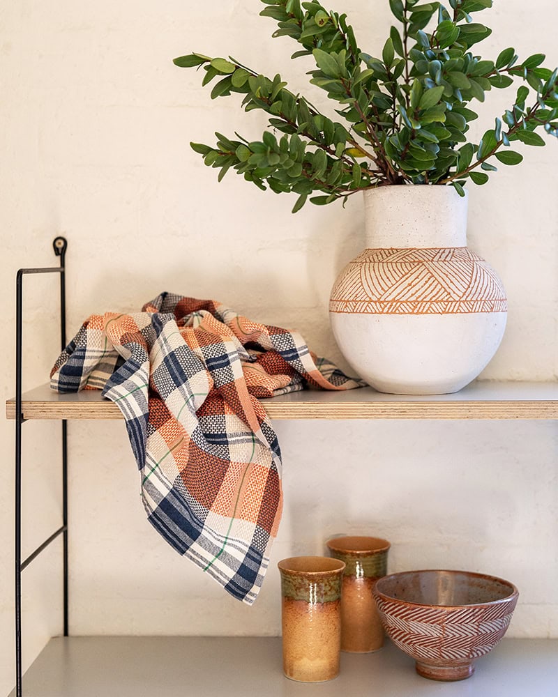 Mungo 100% cotton waffle weave kitchen cloth on a shelf