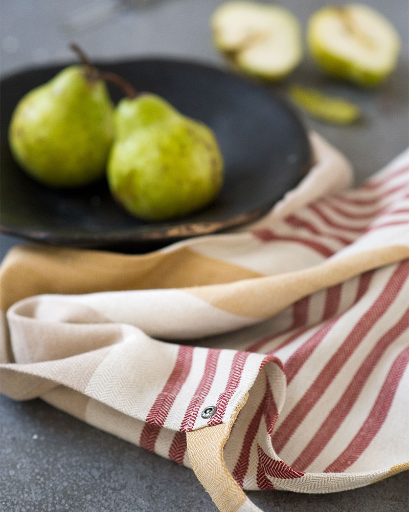 Close up of the Mungo Chef's Apron in Yam, woven at our mill in Plettenberg Bay, South Africa