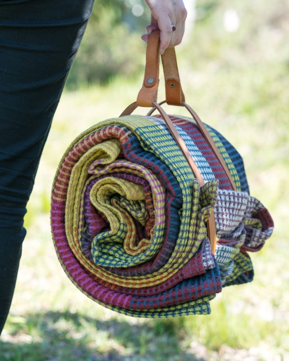 A picnic essential - the Mungo Vrou-Vrou Blanket. A colourful pure cotton blanket woven at the Mungo Mill in South Africa