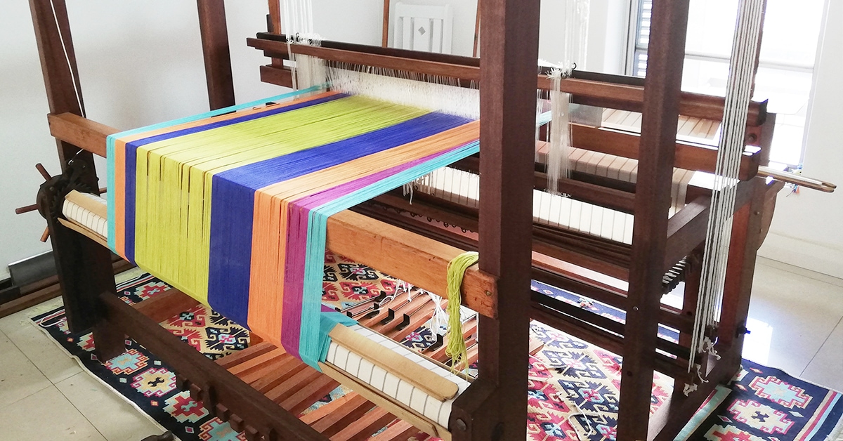 Mungo designer, Lenore Schroeder's handloom, dressed with the warp