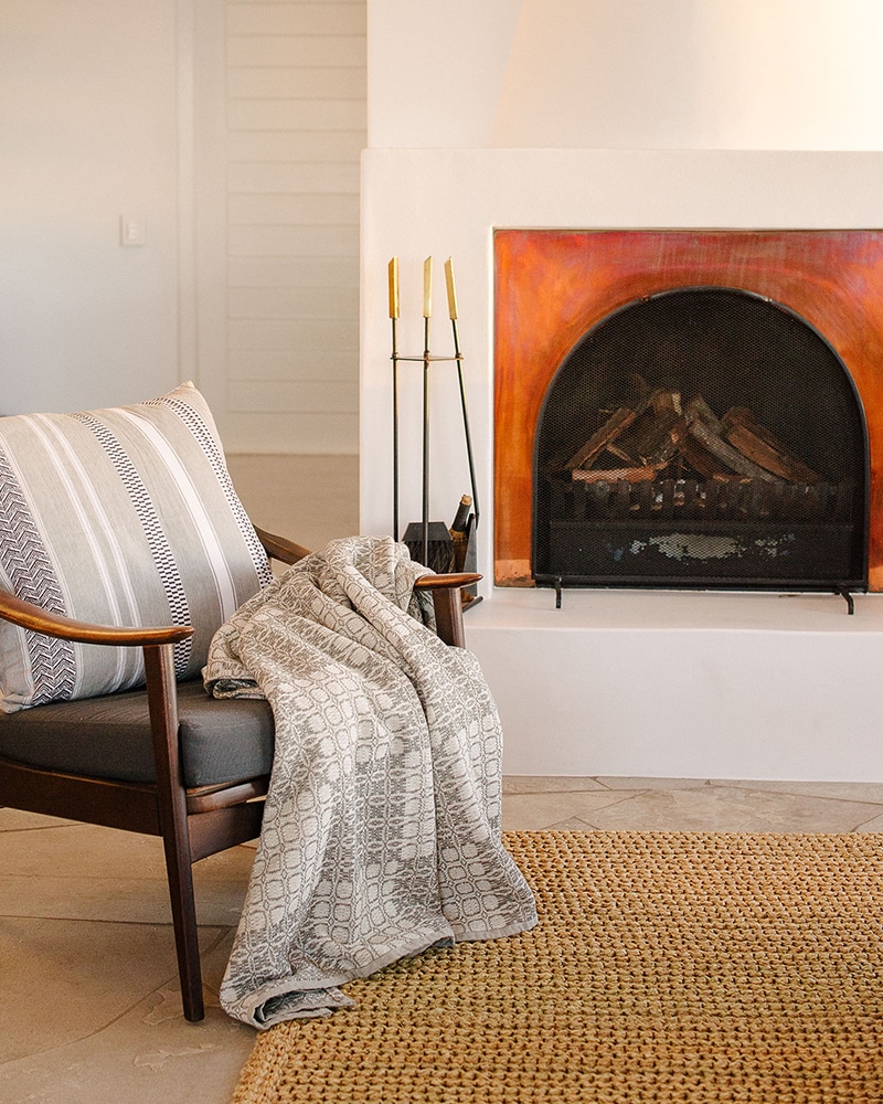 Mungo Juno Throw in Grey. 100% cotton throw, inspired by traditional 18th century American coverlets. Woven at the Mungo Mill in South Africa