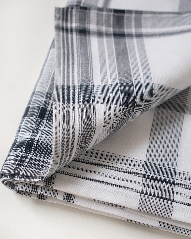 Mungo Crags Check in Indigo. A cotton tablecloth with a classic check detail. Made in SA