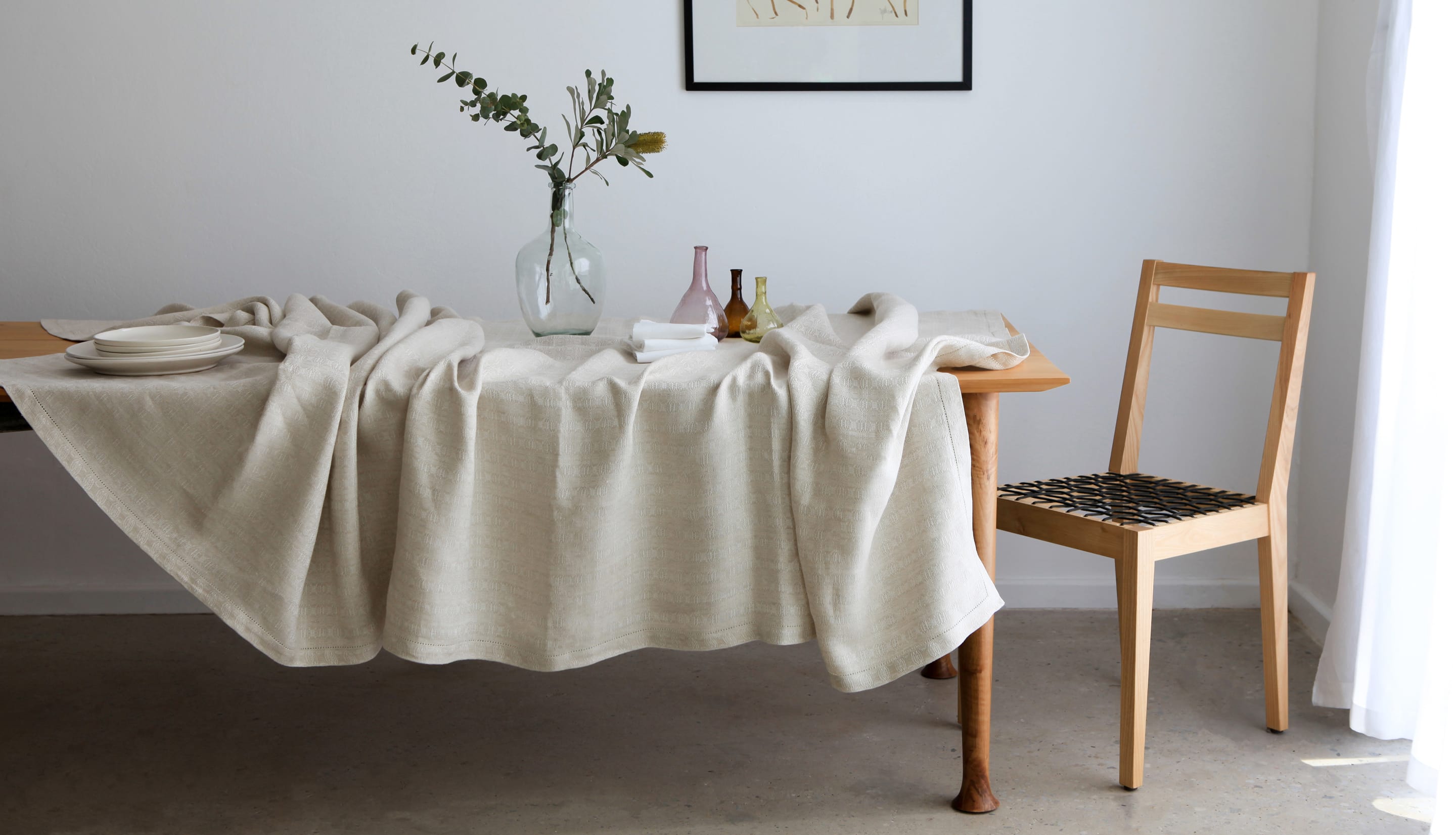Mungo Cloverleaf Table Linen. Pure linen tablecloths & napkins with an intricate four-leaf design. Woven at the Mungo Mill in Plettenberg Bay
