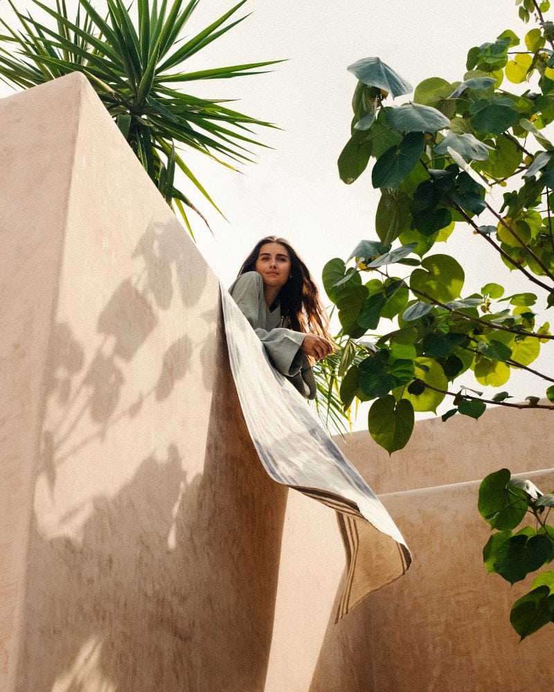 Model overhead with a Mungo Huck Towel hanging on the wall