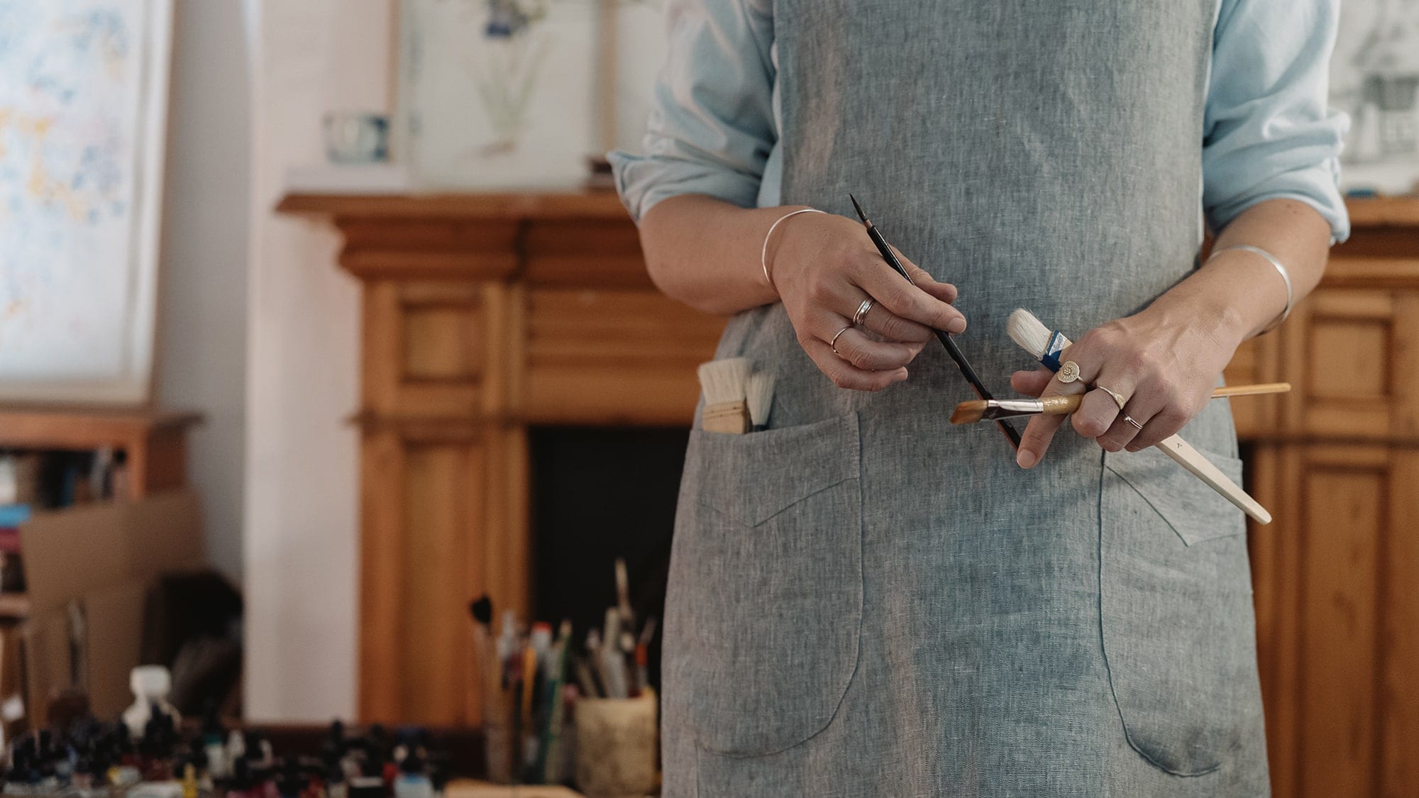 In the studio with illustration Katrin Coetzer, wearing the Mungo Artists Apron