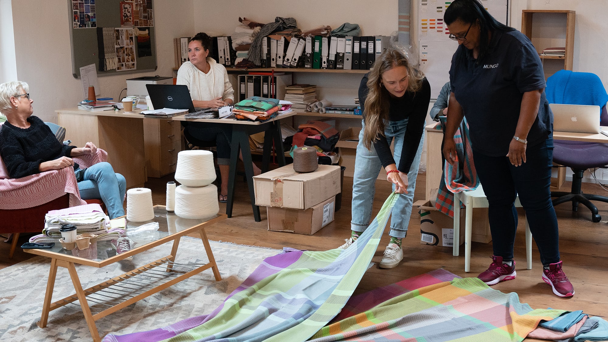 Reviewing the new Folly Beach towel in the Mungo design office. Homeware textiles woven at the Mungo Mill in Plettenberg Bay, South Africa