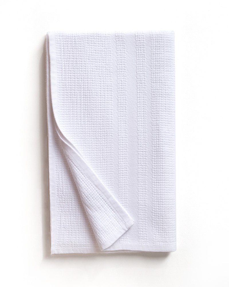 The Mungo Organic Block Rib Towel in White. A quick drying, absorbent, soft bath towel. Woven with organic cotton at the Mungo Mill in South Africa