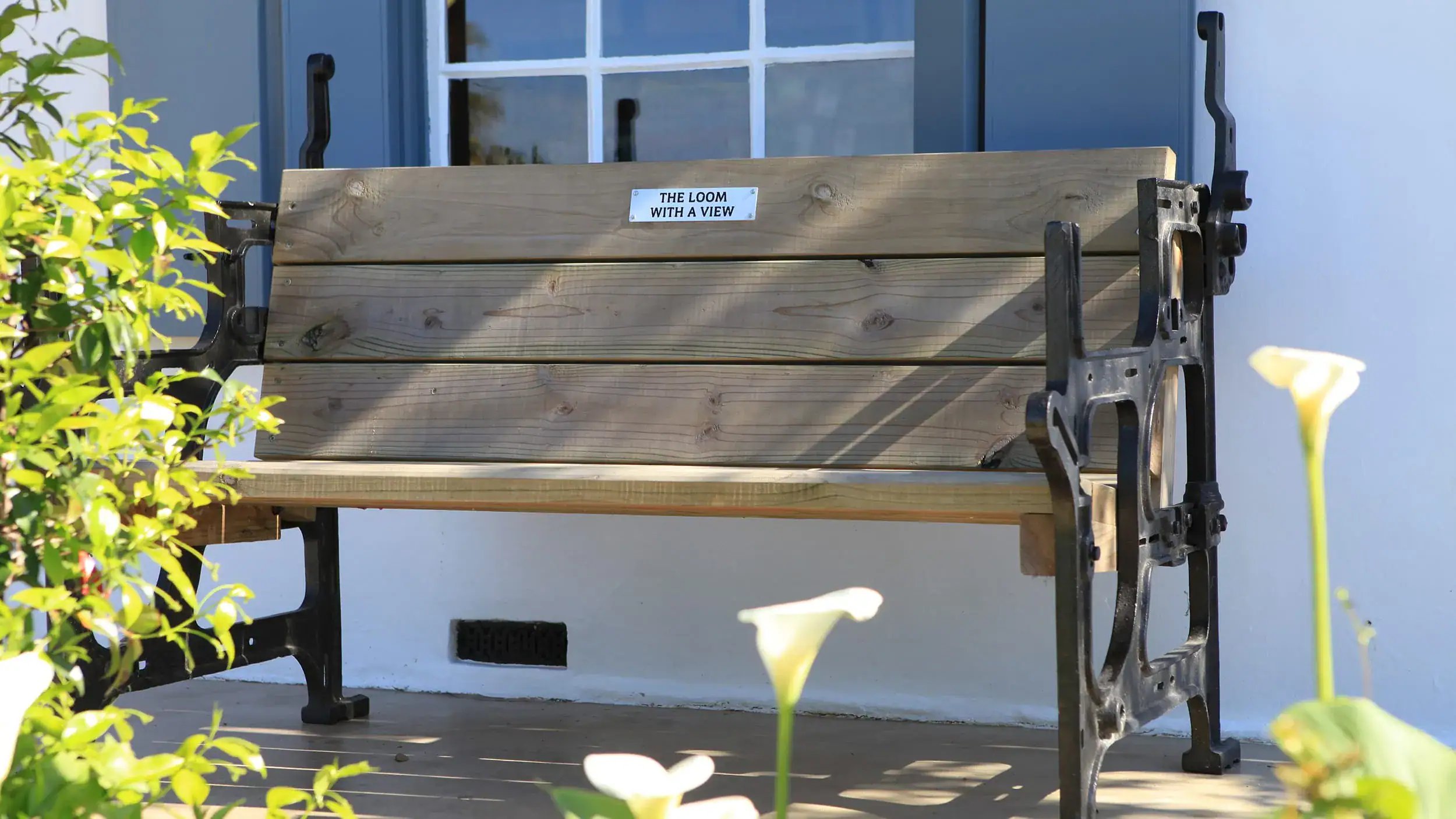 Bench built from loom parts, outside the Mungo shop at Old Nick Village