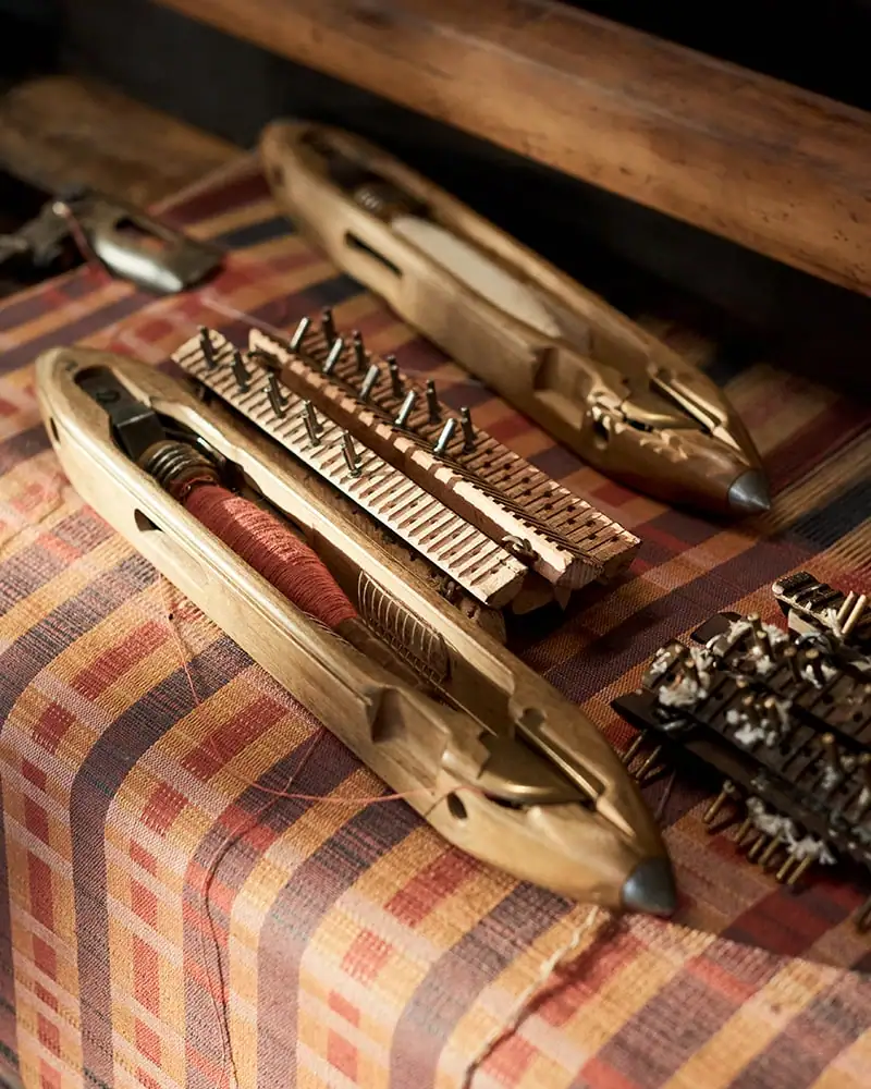 Shuttle on the loom at the Mungo Mill