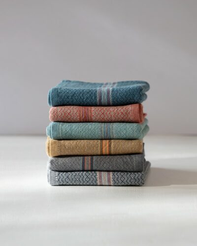 A stack of woven Boma Napkins