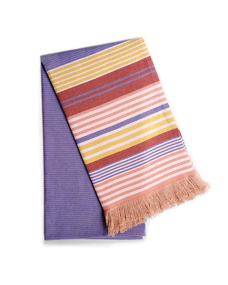 The folded Kids of Kurland cotton wrap in Galaxy