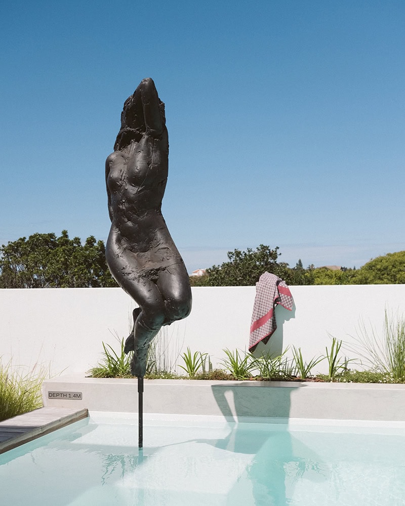 The Walkers Beach art collection featuring pool sculpture from Dylan Lewis and the Mungo Willow Beach Towel