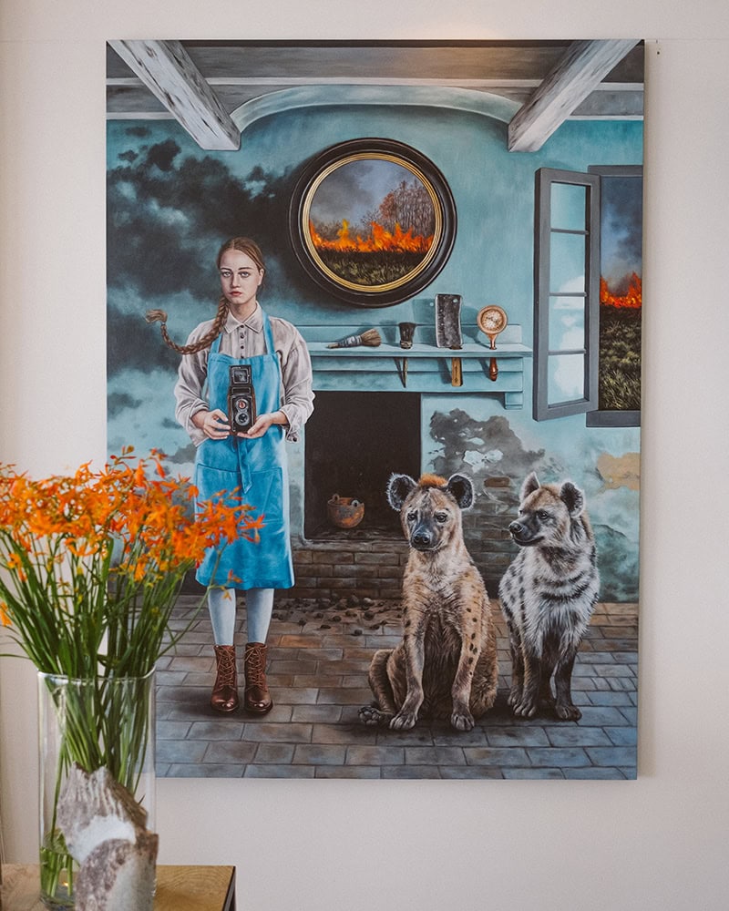 The Walkers Beach art collection featuring a surrealist painting from Angela Banks