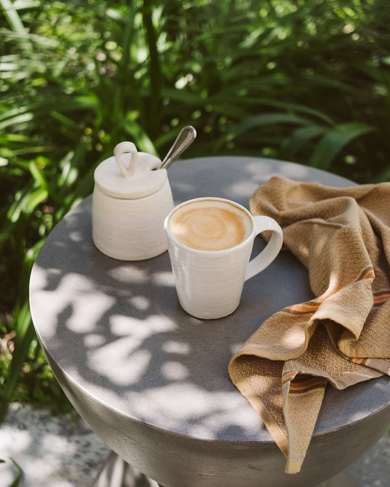 Barefoot Luxury is a Cappuccino - ceramics by Almer - and a Mungo Boma Cloth