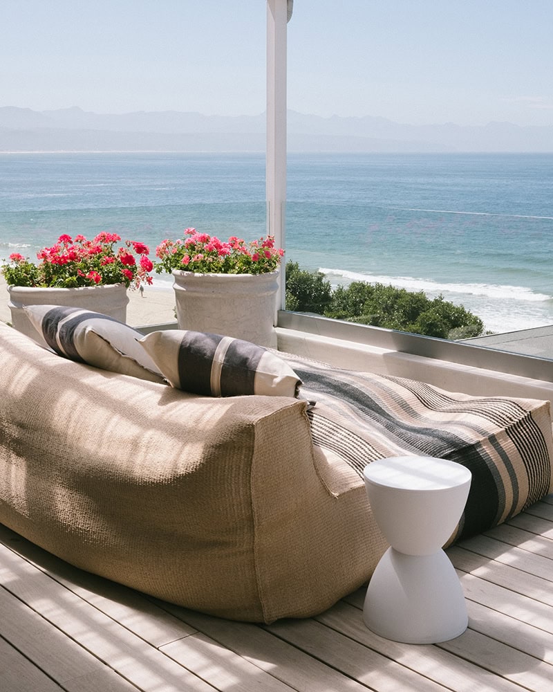 Barefoot Luxury is Mungo Lisburn Cushion covers and an unobstructed view of the Plettenberg Bay coastline
