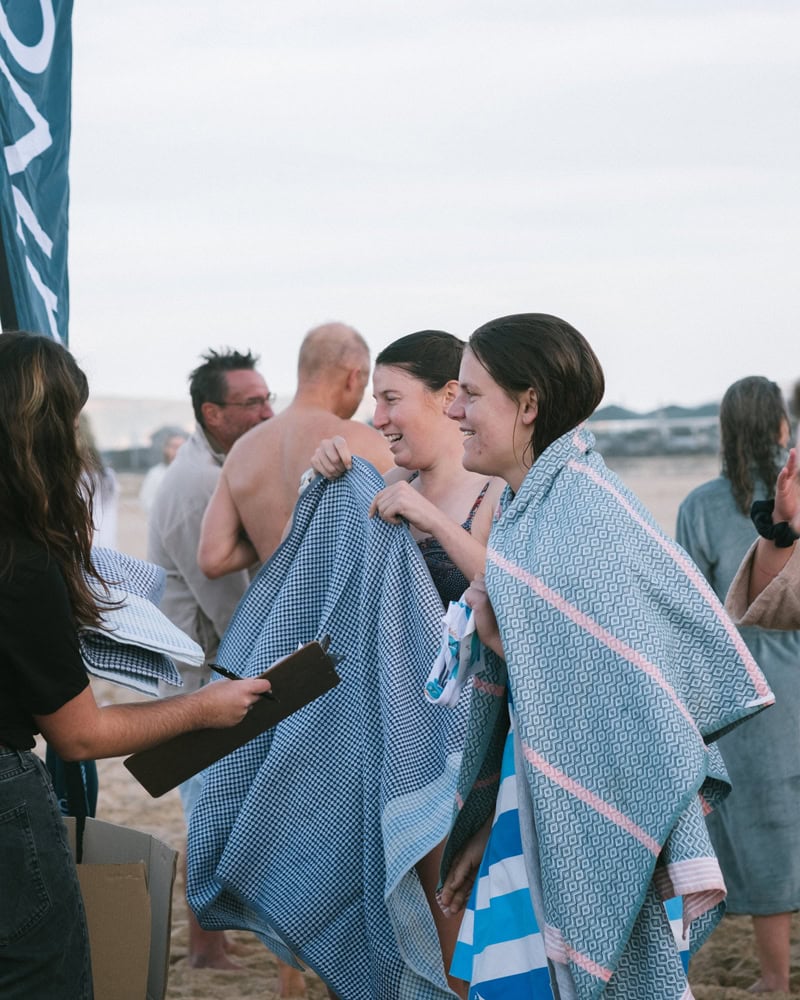 Mungo designed custom flatweave beach towels for the Winter Solstice Swim