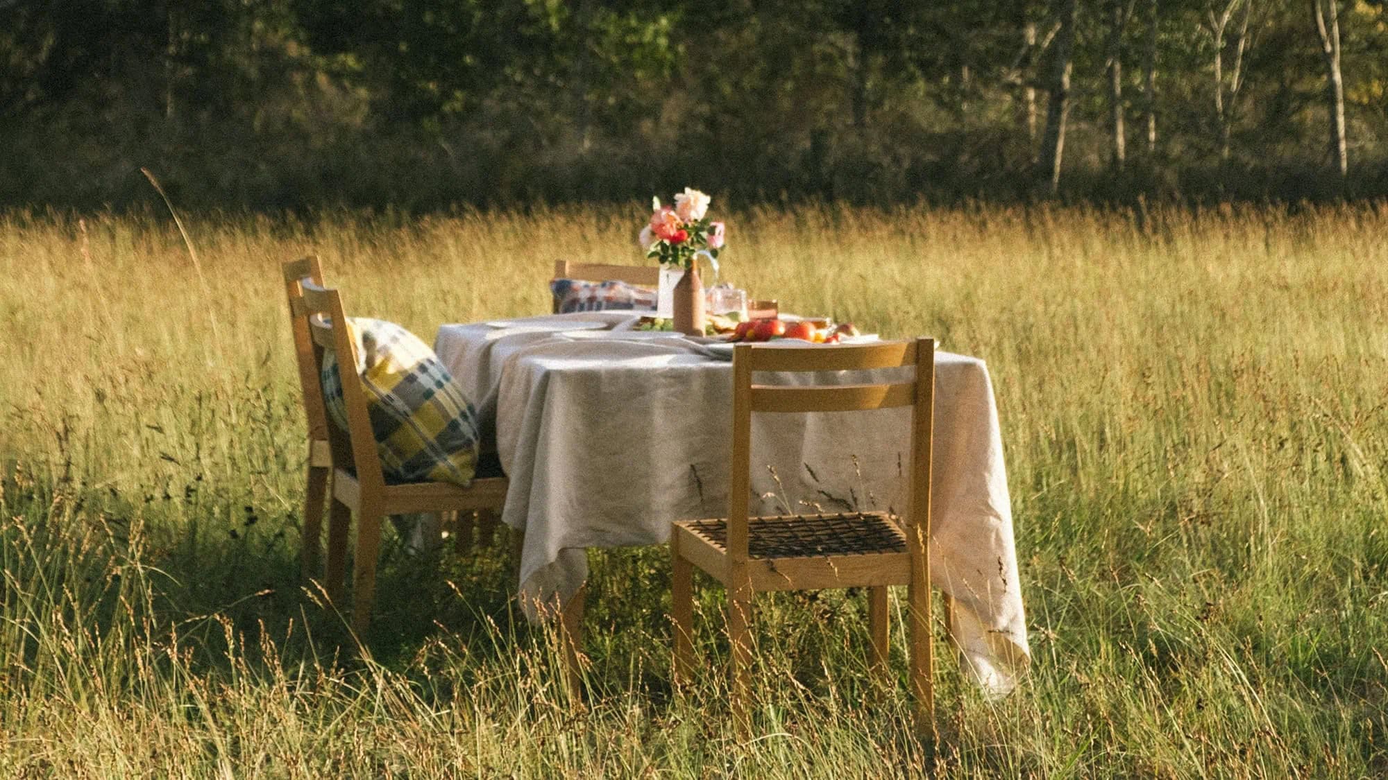 Mungo Linen Tablecloth in a field. Homeware textiles woven with