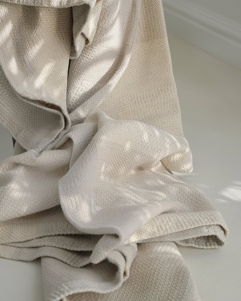 The Savannah Throw in Grassland is a cotton and linen multi-textural throw blanket