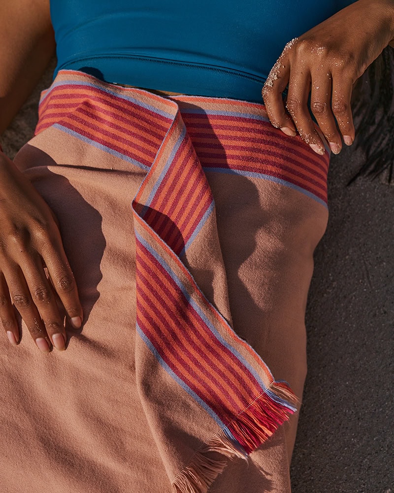 Model with the Apricot Kikoi wrapped around her waist
