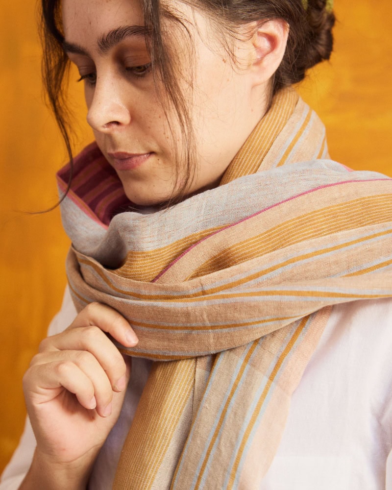 Artist, Lene Ehlers, wearing the Mungo Macaron linen scarf